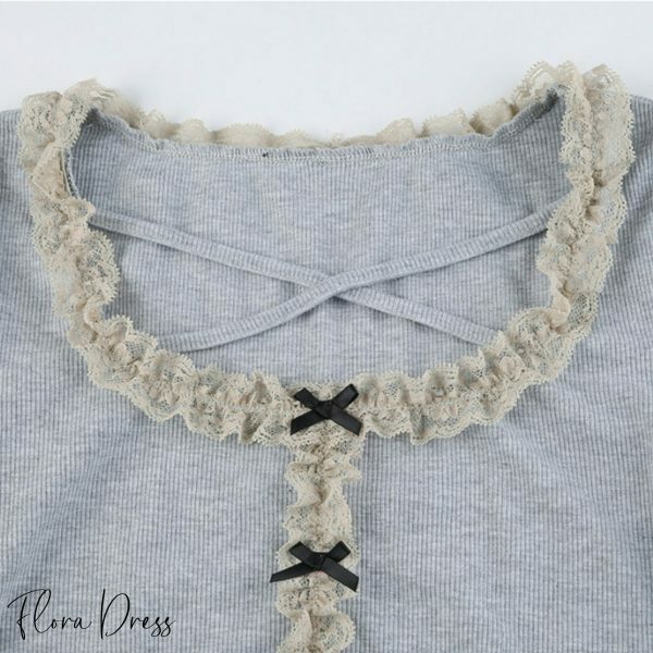 Y2K Lace Trim Crop Top for Coquette Streetwear Aesthetic
Fairy Grunge Aesthetic Tshirt with Coquette Bow Lace
Korean Fashion Fairycore Long Sleeve Tee